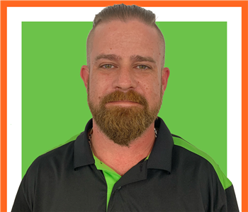 Eric, male, SERVPRO employee, in front of white background