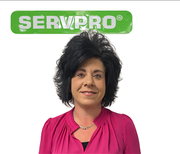 Christy, Female, SERVPRO employee, pink shirt, green sign