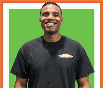 Eddie, SERVPRO employee, cut out and set against a green backdrop