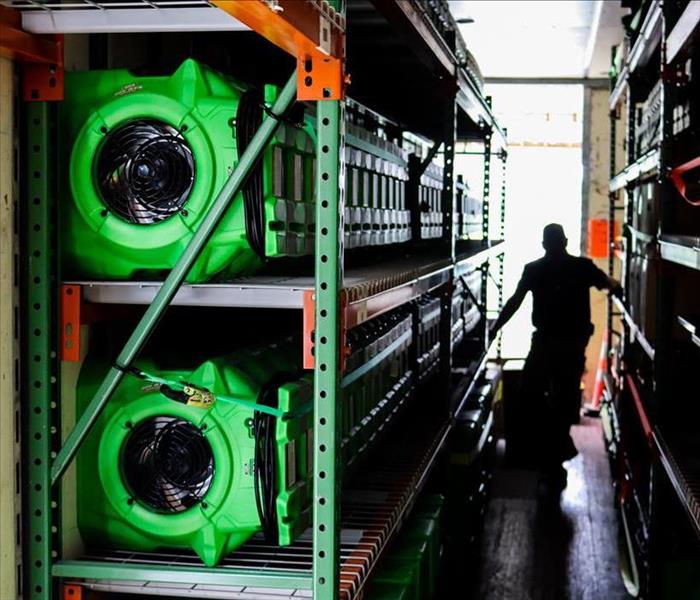 Equipment stacked up in a truck.